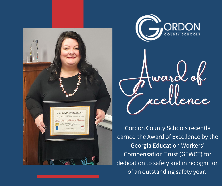 Gordon County Schools earns Award of Excellence - picture of a woman with a certificate