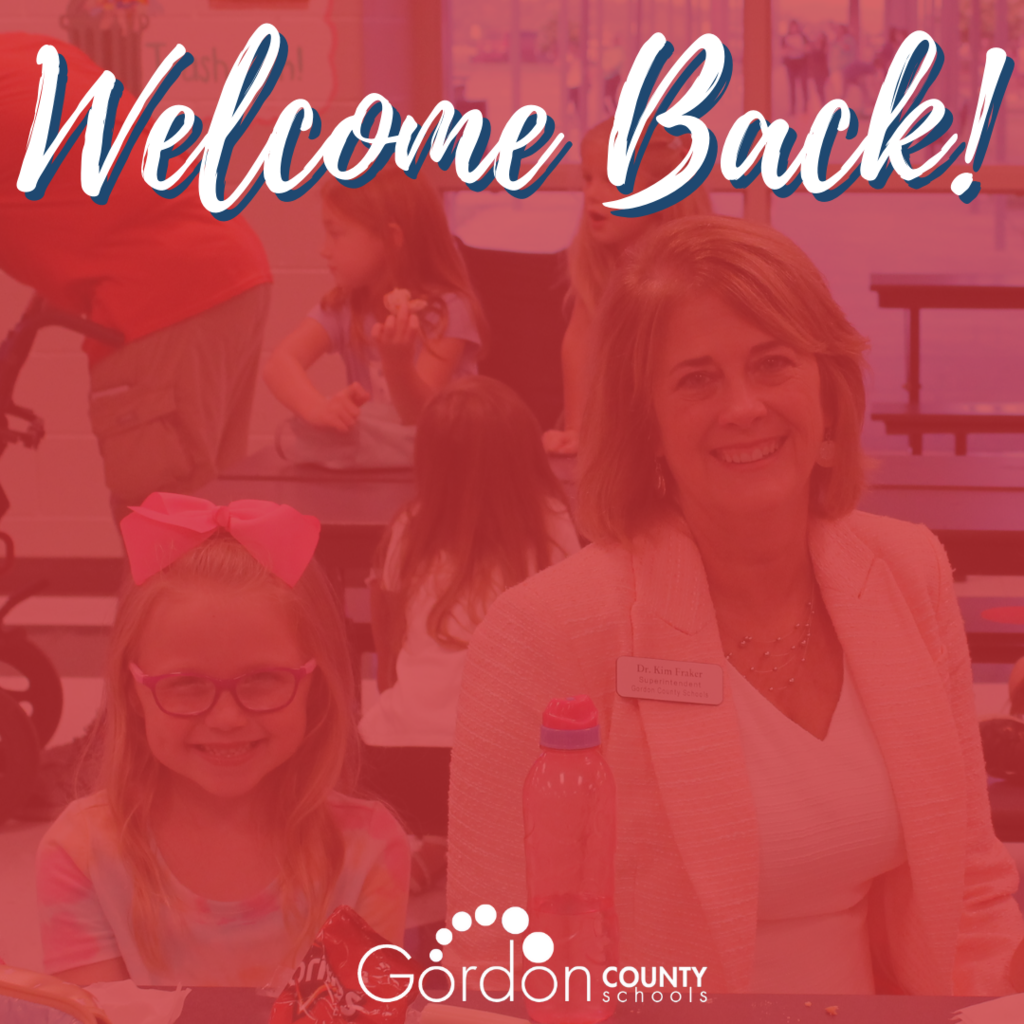 image of two people smiling while sitting at a table. "Welcome Back" and the Gordon County Schools Logo