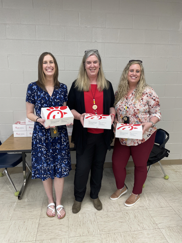 3 adults show off their cfa boxes