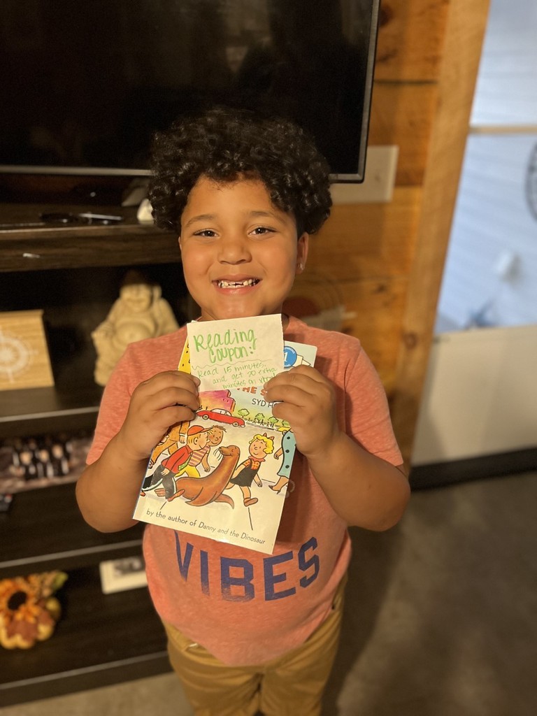 Kylan Daniel shows off the activity he completed