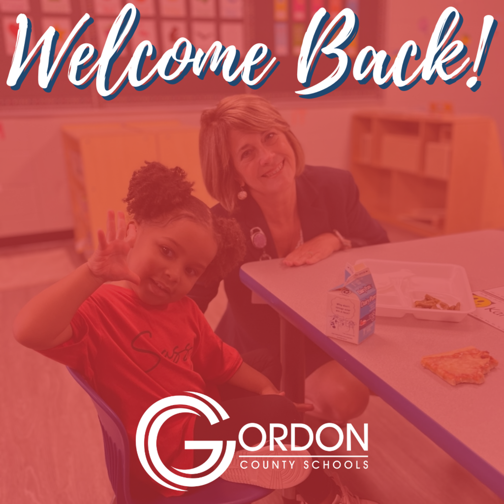 Dr. Fraker and a Student say "Welcome Back" witht he Gordon County Schools Logo