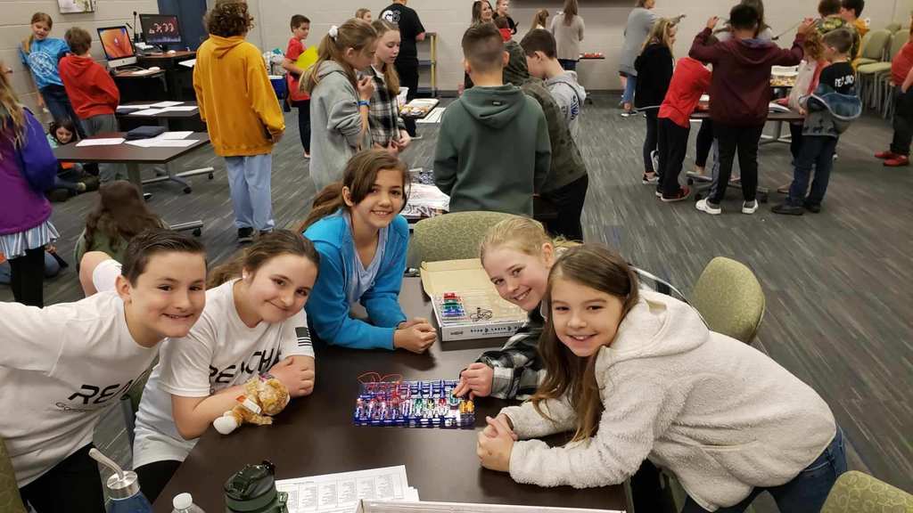 students smile together as a group