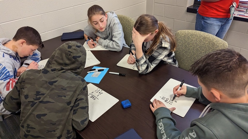students work on math problems